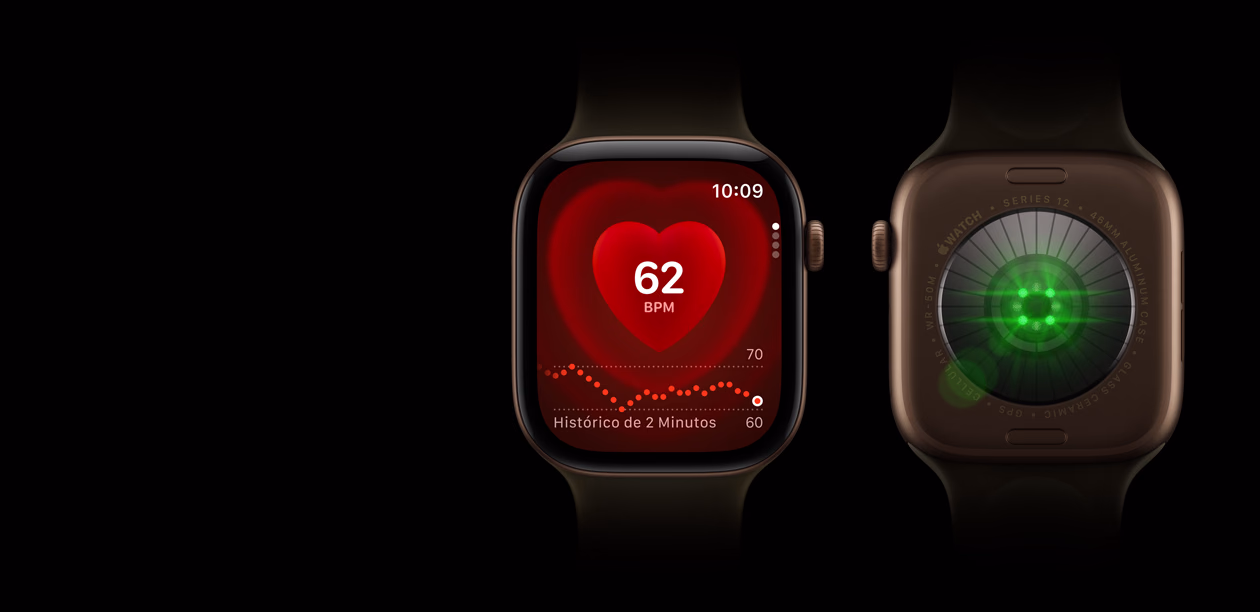Dois relógios Apple Watch Series 12 com caixa de alumínio bronze-escura e pulseira esportiva oliva. Um mostra o app Batimentos, e o outro mostra o Sistema de Medições de Saúde na parte de trás do relógio, com luzes LED verdes brilhantes