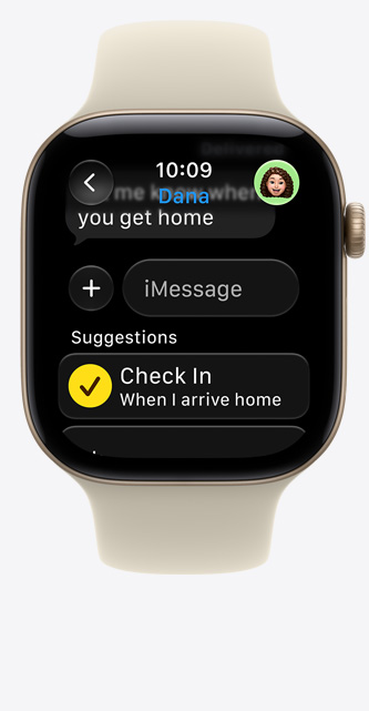 Apple Watch Series 12, screen shows Check In suggestion in iMessage, aluminum case, light gold color, connected to Sport Band, sand color (pale tan)