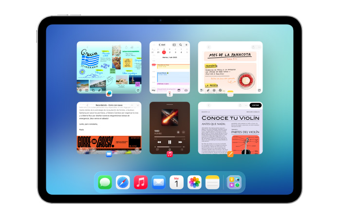 Un iPad, posición horizontal, la pantalla muestra seis ventanas abiertas en dos filas, incluidas las apps Calendario, Notas, Apple Music y Safari