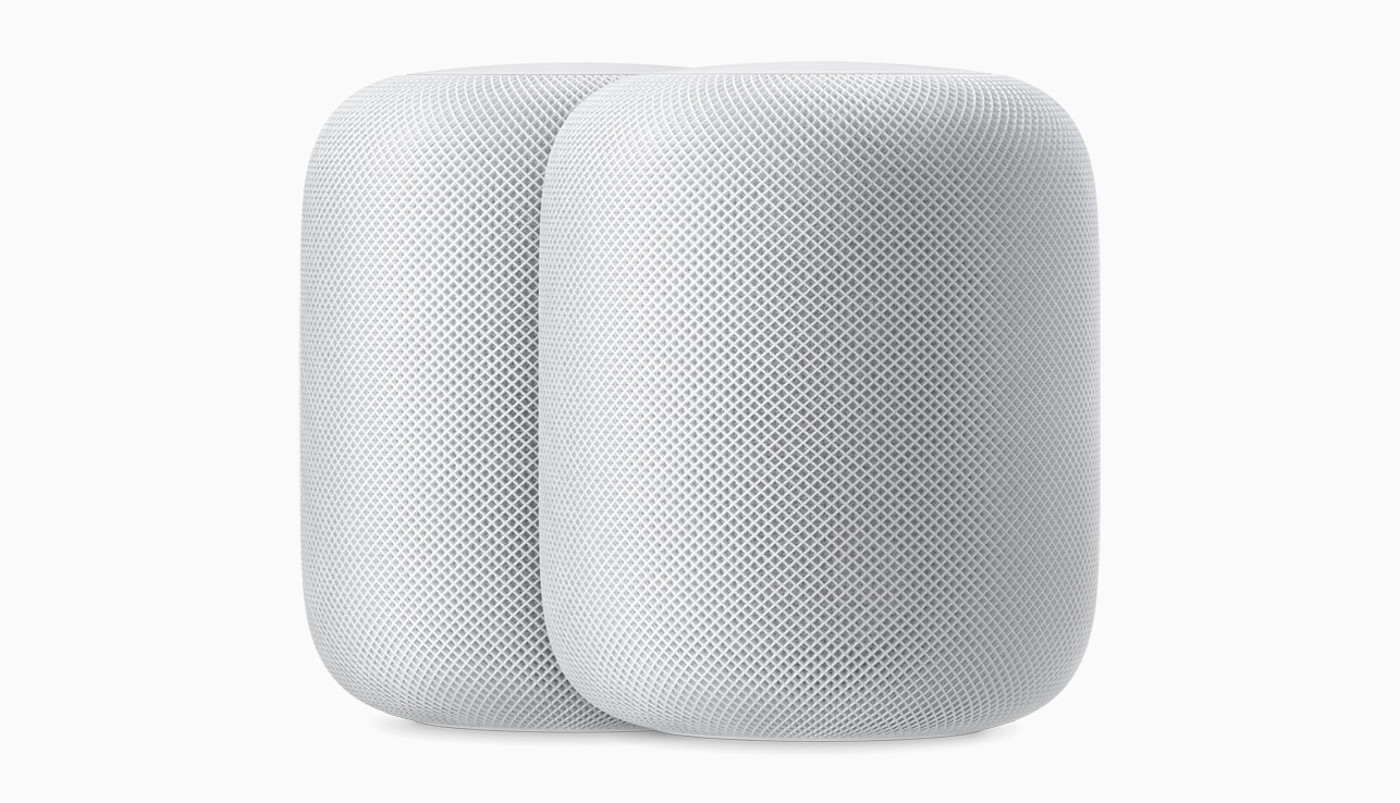 Two white HomePods.