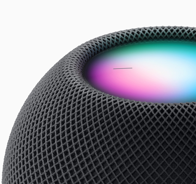 Siri-activated HomePod mini in space grey.
