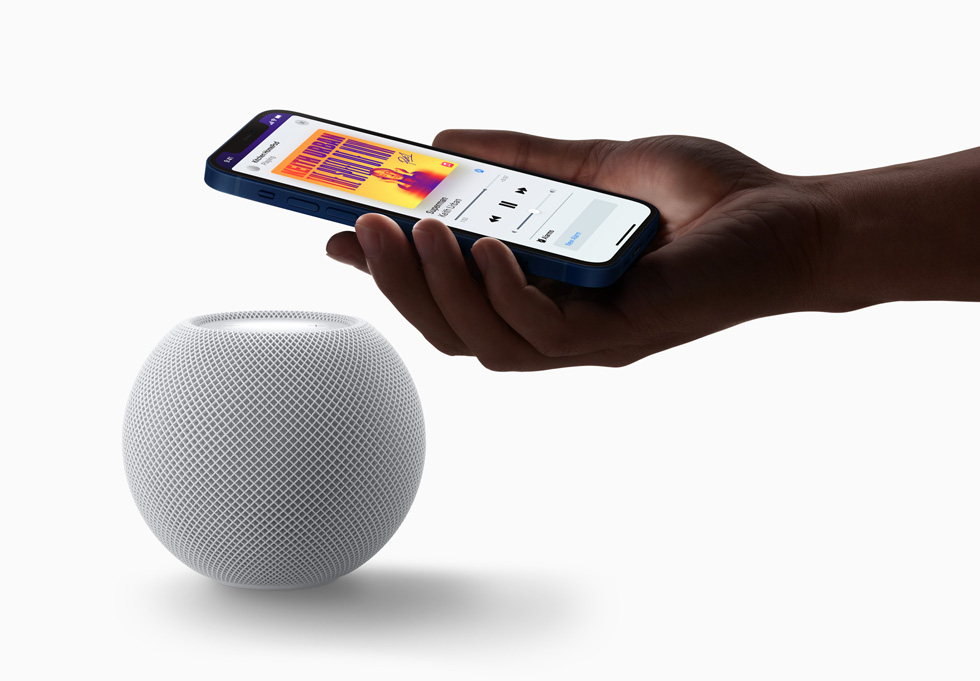 HomePod mini integrating with Apple Music on an iPhone 12.
