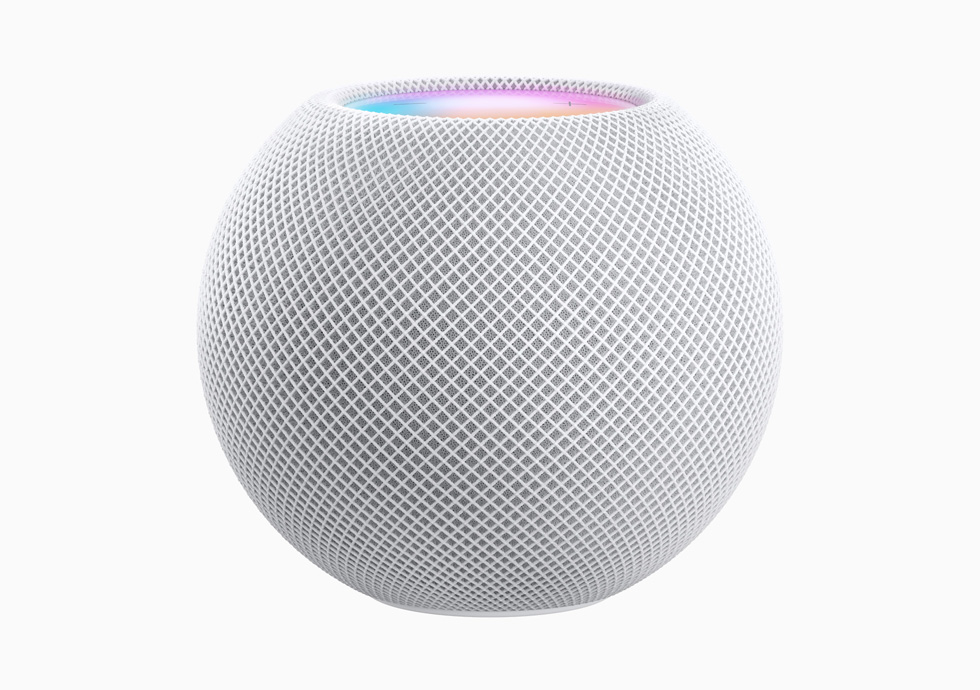 A powered-on HomePod mini.