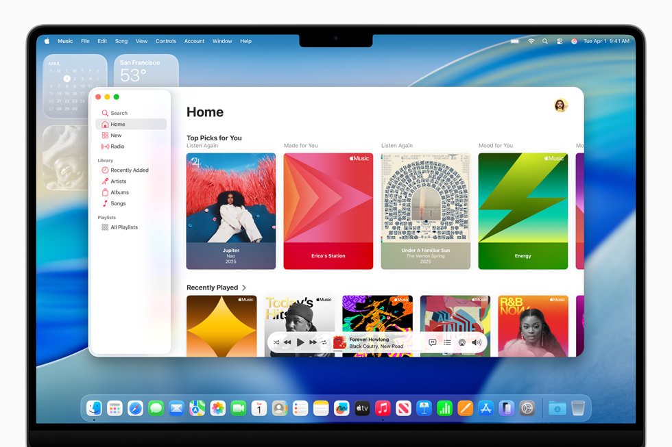 16-inch MacBook Pro shows Apple Music with the new design in macOS Tahoe.