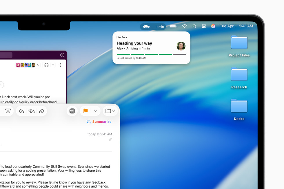 MacBook Pro shows an Uber Eats order in Live Activities.