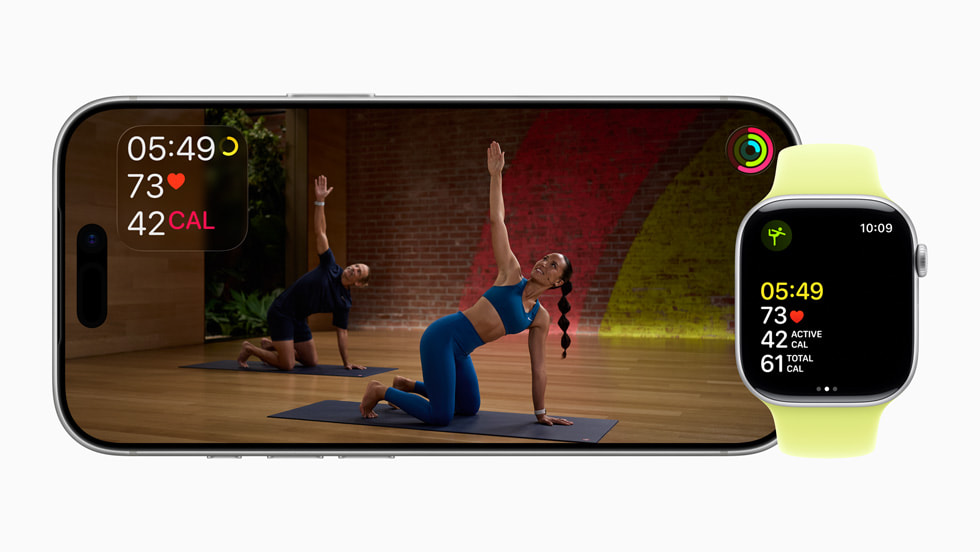 A Yoga workout in Fitness+ displayed on iPhone and Apple Watch with metrics onscreen.