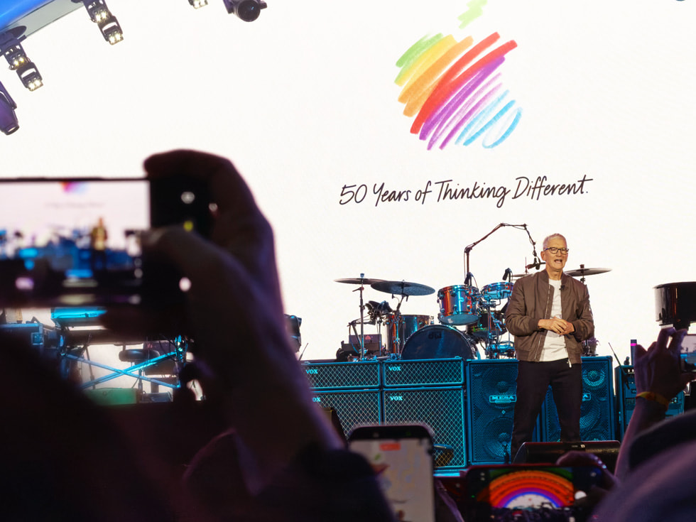 Tim Cook is shown on stage at Apple Park in Cupertino.