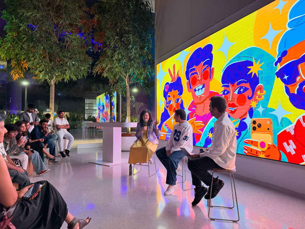 Mira Felicia Malhotra and Anuv Jain speak with a moderator at Apple BKC in Mumbai.
