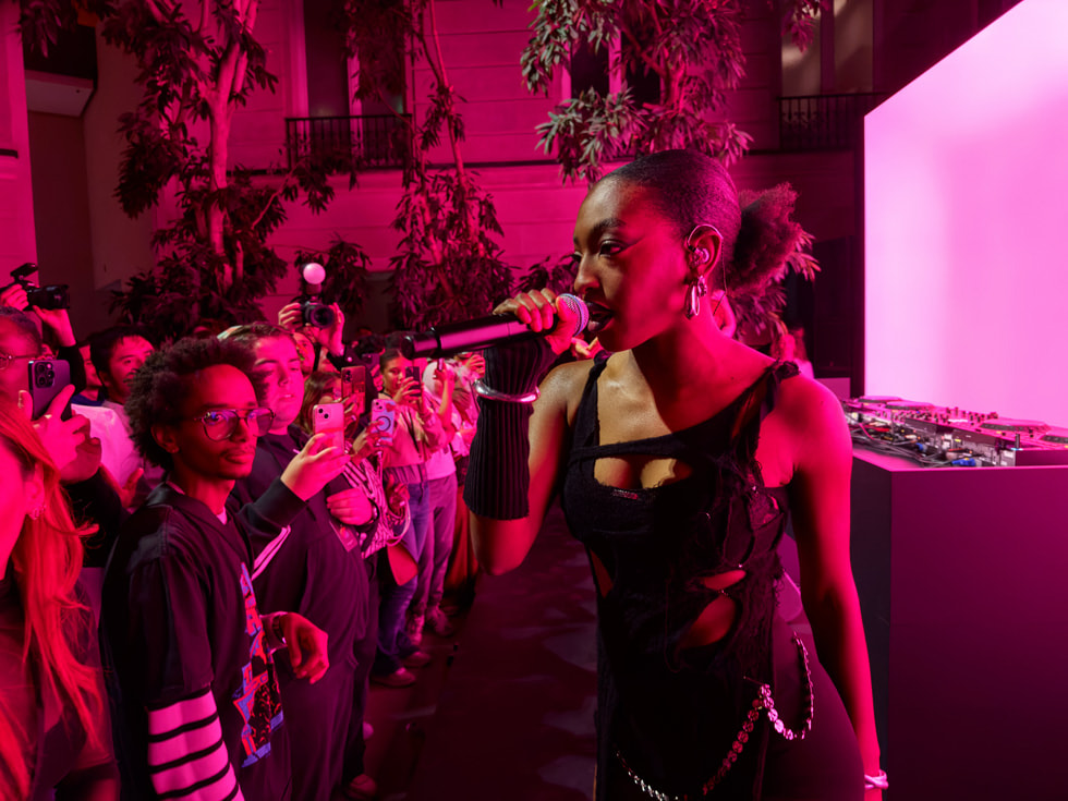 Ebony is pictured performing at Apple Champs-Élysées in Paris.