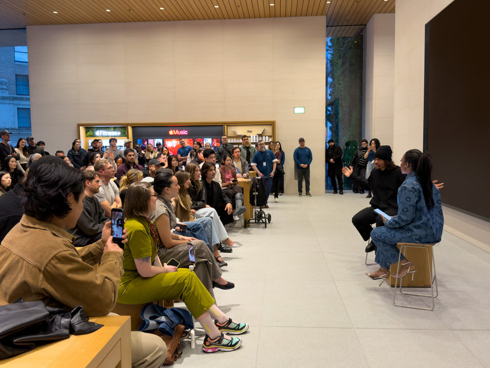 The audience watches a Today at Apple session featuring Elladj Baldé.