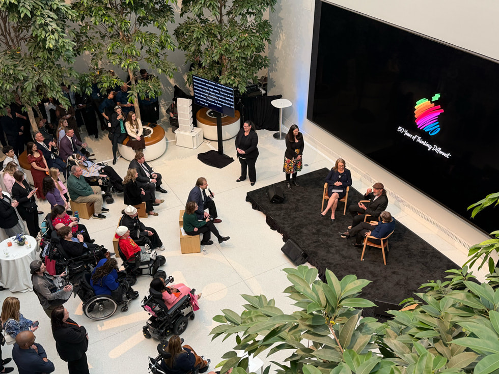 An overhead view shows the discussion about Deaf creativity at Apple Carnegie Library in Washington, D.C.