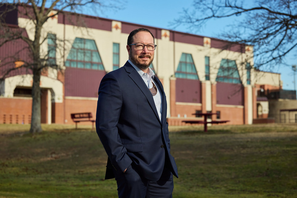 Bryan Warner is pictured standing outside.
