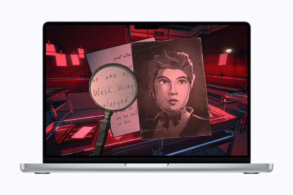 The Blue Prince game on a 14-inch MacBook Pro shows a first-person view of a magnifying glass over a note next to a portrait in a red-lit room.