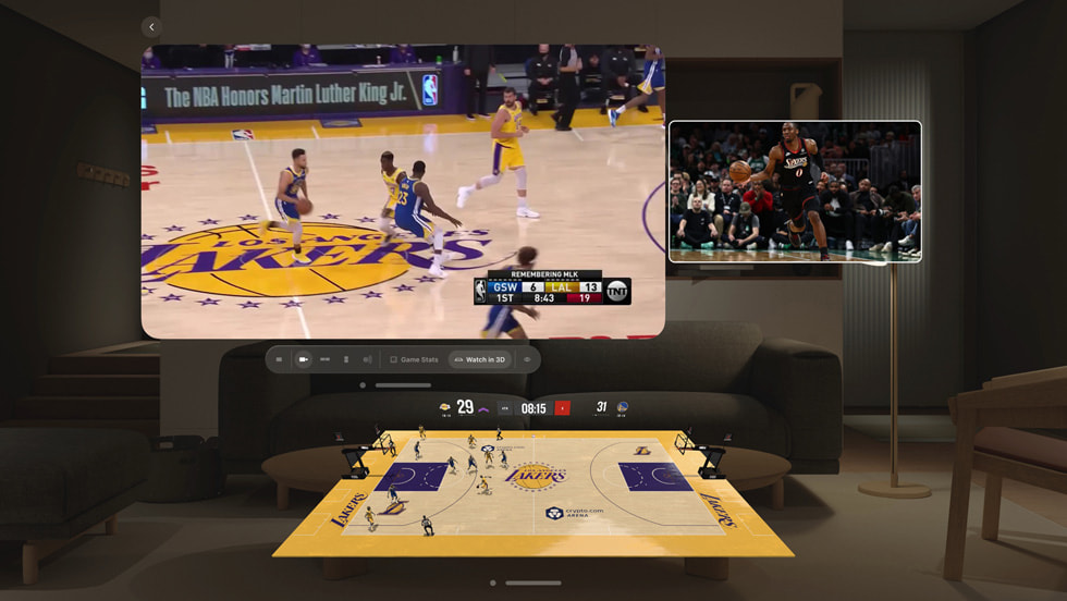 The NBA: Live Games & Scores app on Apple Vision Pro shows multiple basketball games and stats windows floating in a living room environment.