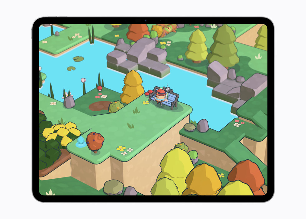The Pine Hearts game on a 13-inch iPad Pro shows a character in a colorful, isometric world near a river and trees.