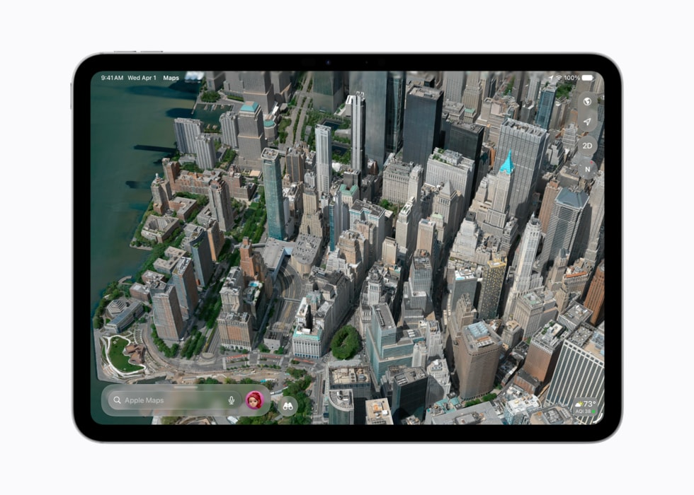 iPad shows an aerial view of buildings in Apple Maps.