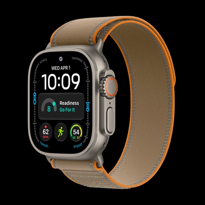 The natural titanium Apple Watch Ultra 4 with theTrail Loop in sand.