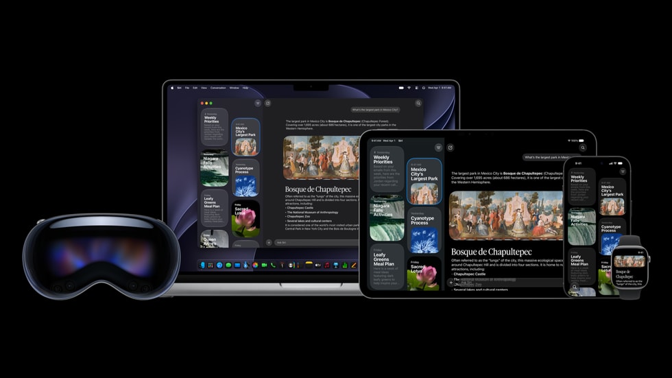 A user’s Apple Vision Pro is shown next to their open Mac and iPad, with both of the latter screens showing the new Siri app.