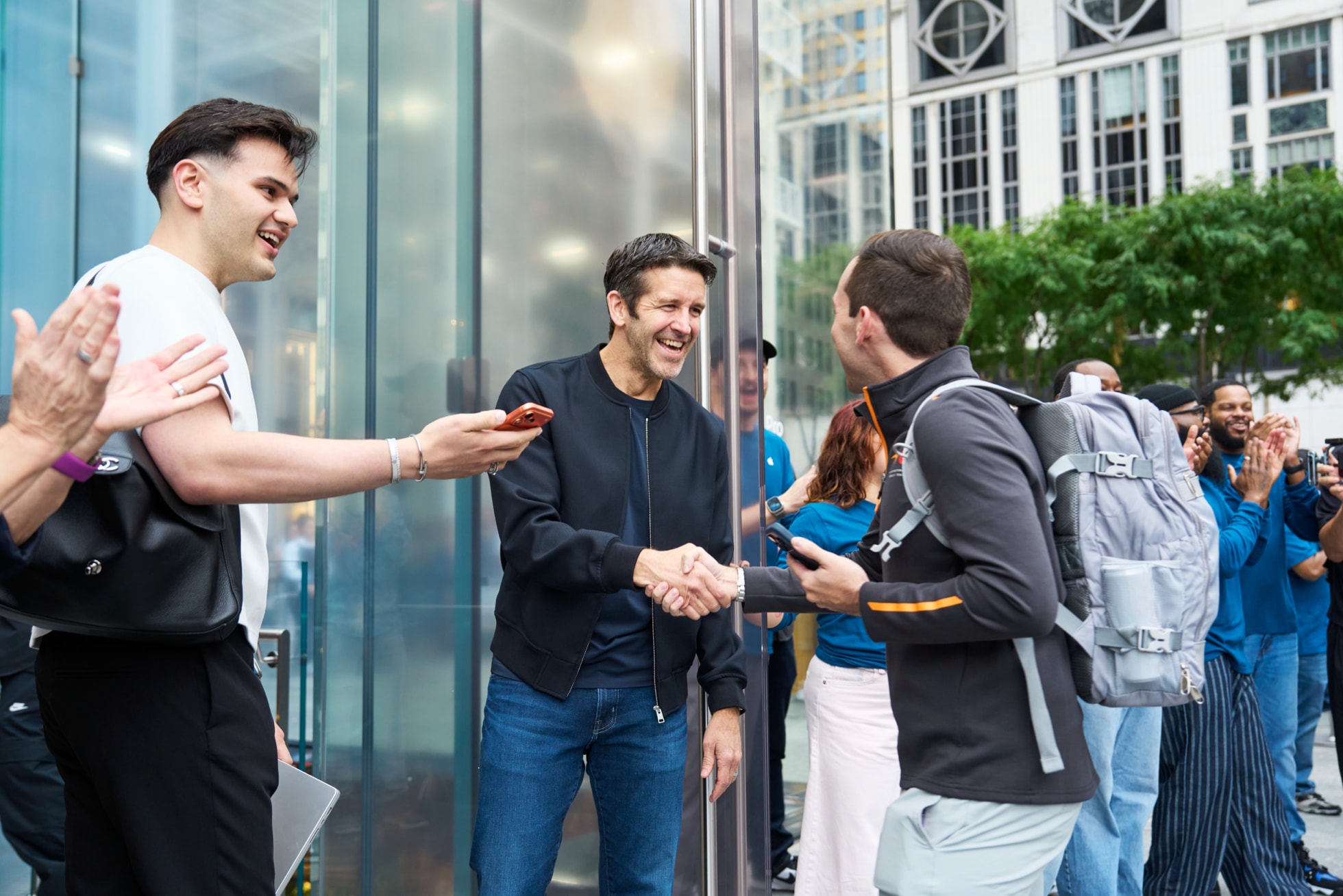 John Ternus greets customers at Apple Fifth Avenue.