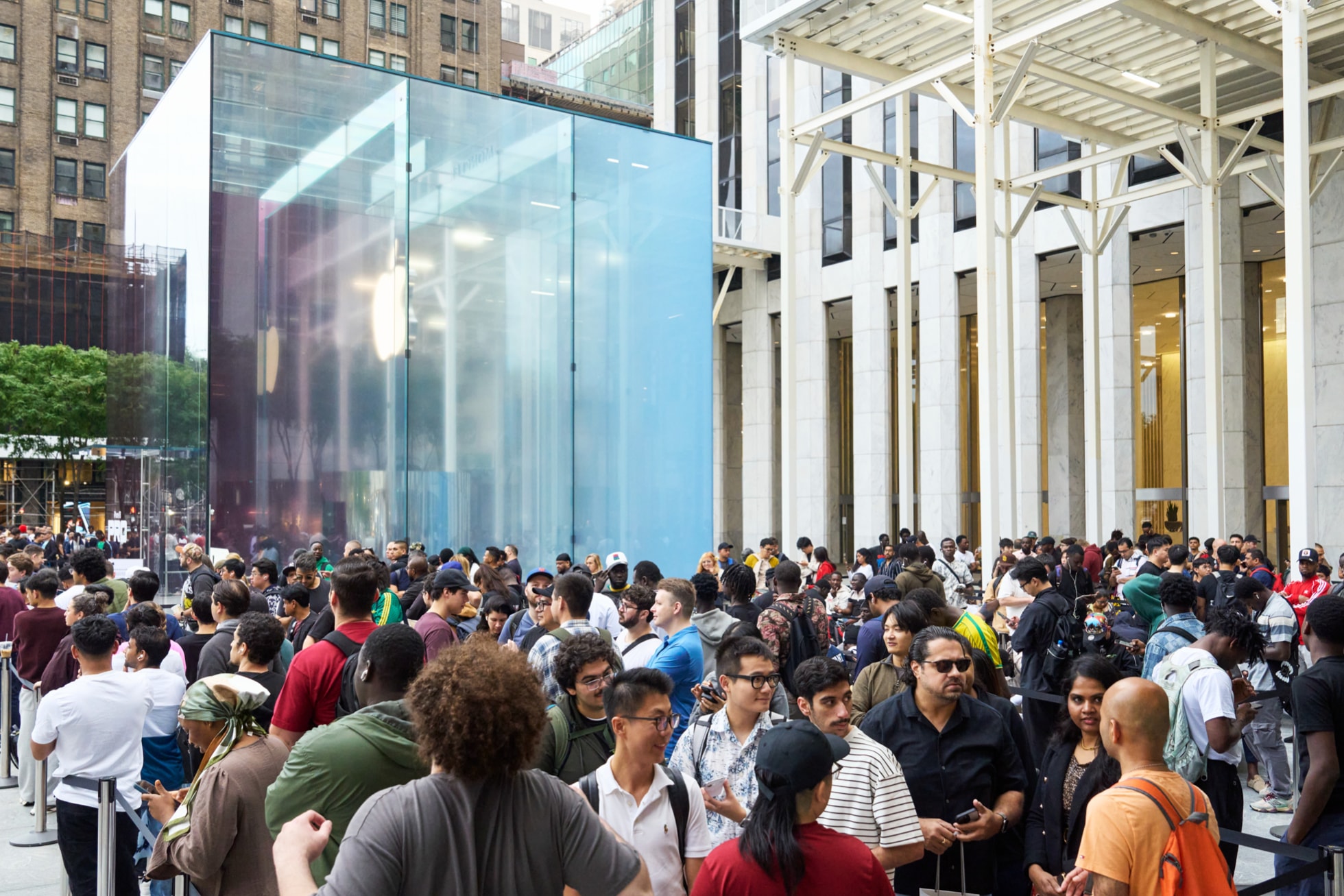 Customers line up outside Apple Fifth Avenue.