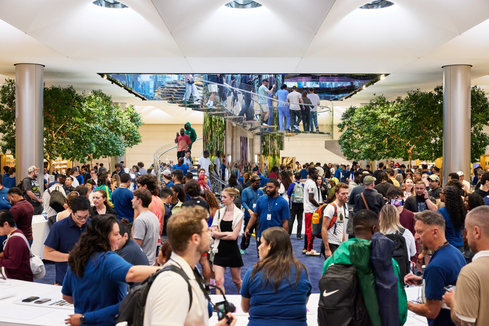 Customers fill up inside Apple Fifth Avenue. 