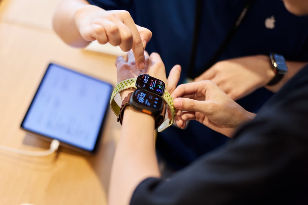 A close-up of a customer’s wrist as they try on the latest Apple Watch models at Apple Jing’an.