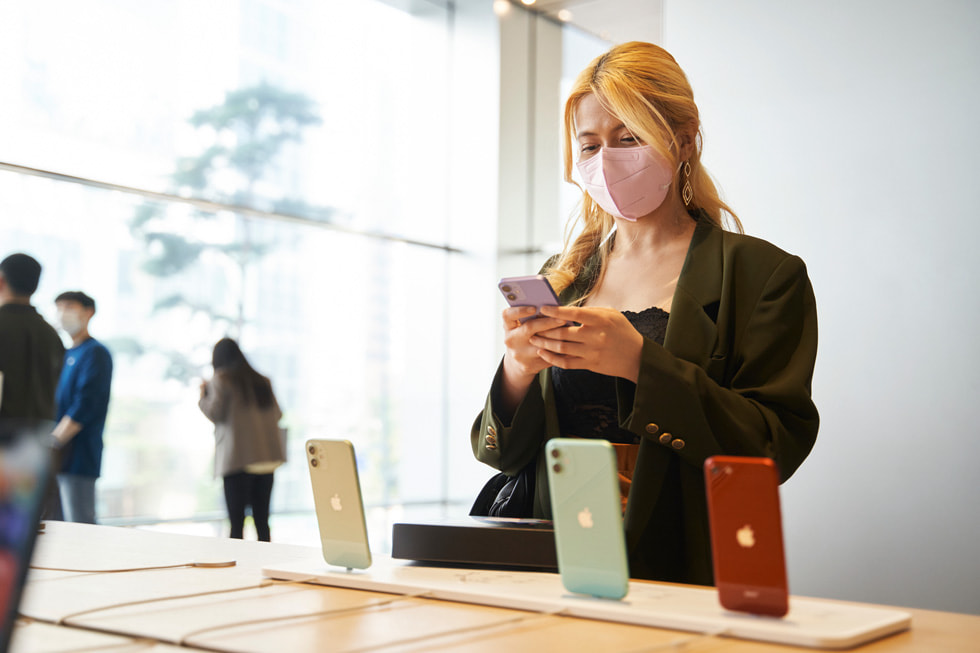 A customer explores the latest products at Apple Myeongdong.