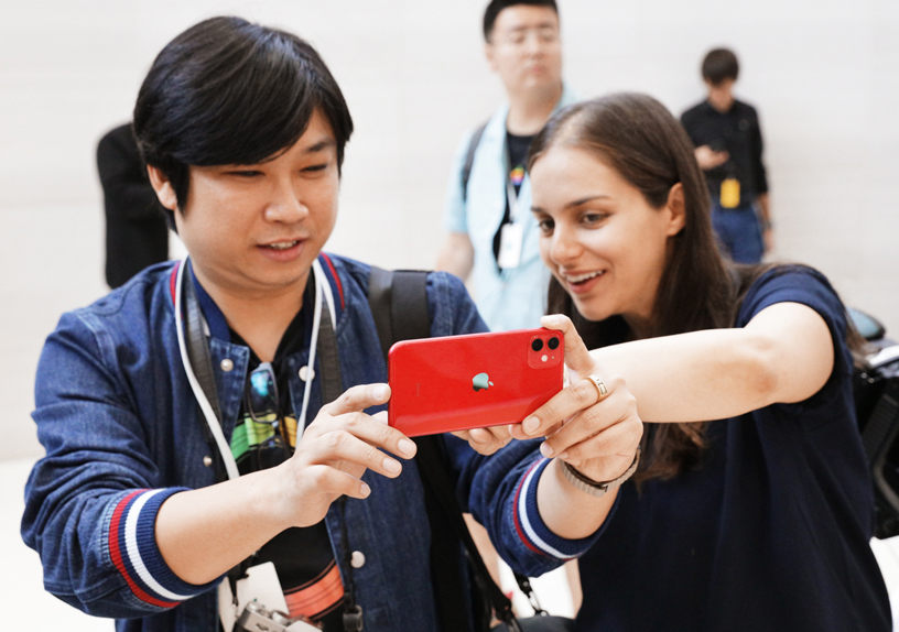 Guests at the hands-on area at Steve Jobs Theater.