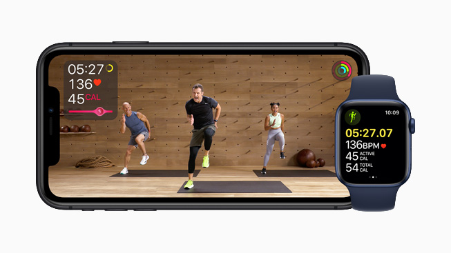 iPhone 11 Pro displaying a studio workout in Apple Fitness+.