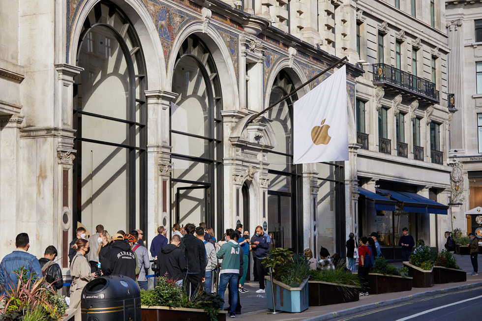 A line of customers outside of Apple Regent Street.