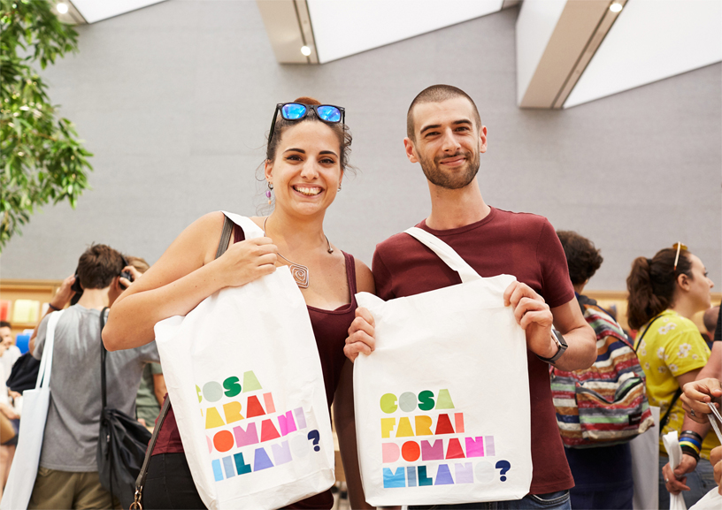 Visitors pose inside Apple Piazza Liberty.
