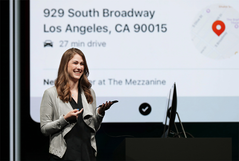 Kimberly Beverett demos Siri Shortcuts on stage at WWDC 2018.