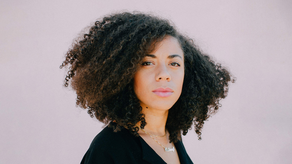 Bethany Mollenkof posing for a portrait.