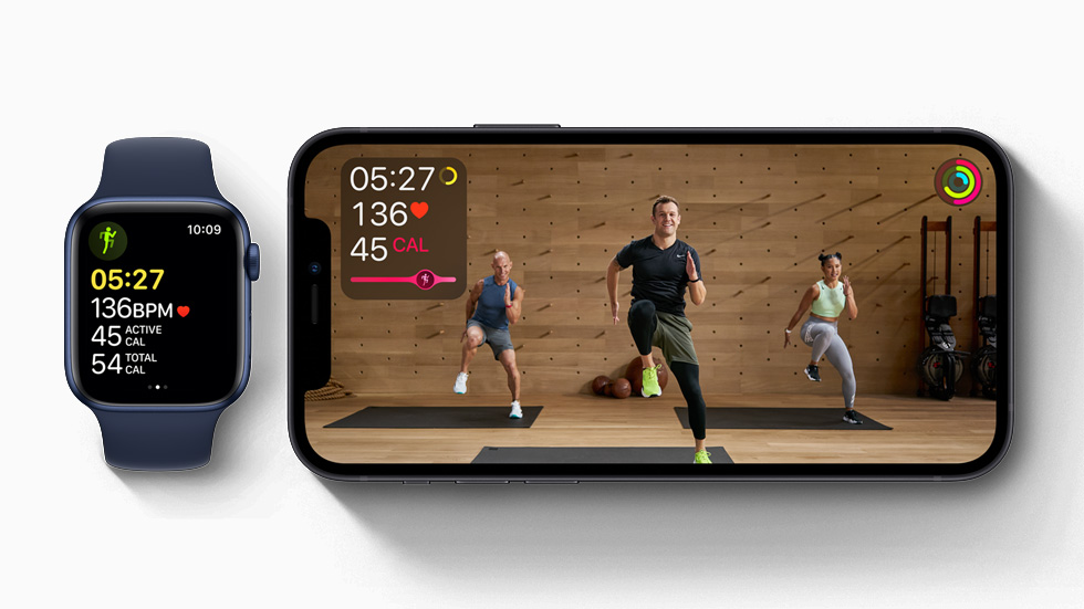 Apple Fitness+ on iPhone 12 and a workout in progress on Apple Watch Series 6. 