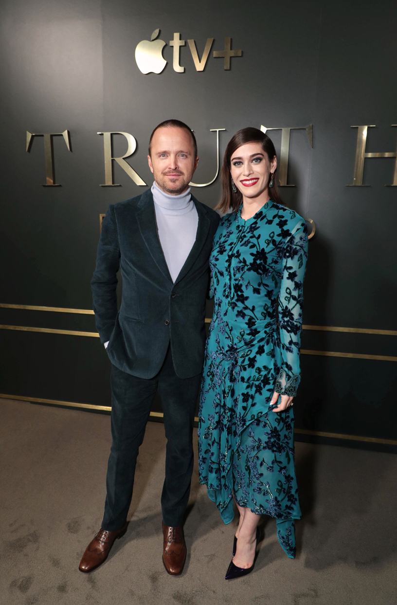 Aaron Paul and Lizzy Caplan.