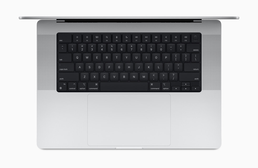 The new MacBook Pro keyboard is shown in detail.