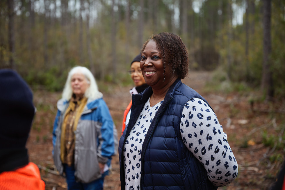 McIntosh S.E.E.D.’s Cheryl Peterson stands outside.