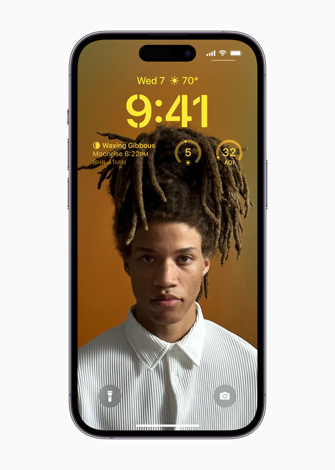 iOS 16’s personalized Lock Screen with widgets on iPhone 14 Pro.