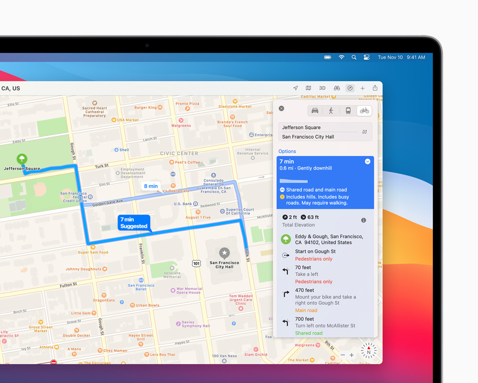 A cycling trip in San Francisco routed and planned in the Maps app is displayed on MacBook Pro.