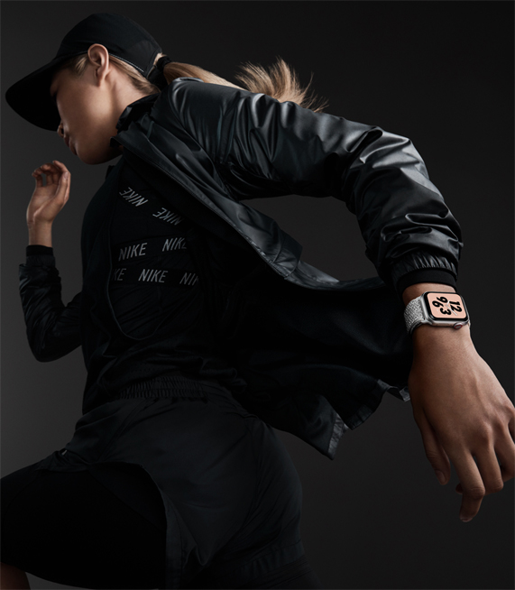 A woman wearing the new Apple Watch Nike+.
