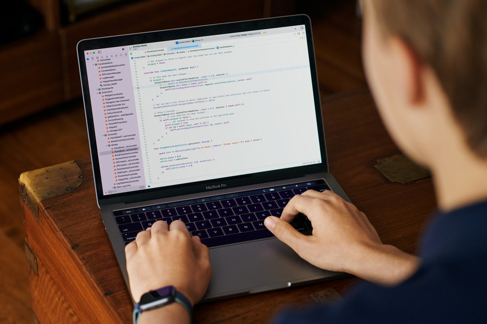 Ben Robinson edits code on his MacBook Pro.