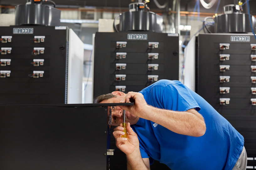 A Maccor employee at the battery testing facility.