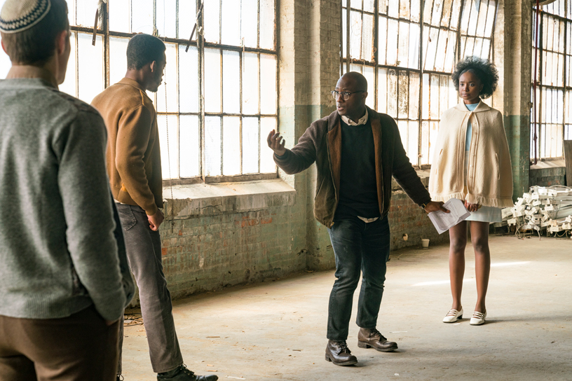 Barry Jenkins on set with actors Dave Franco, Stephan James and KiKi Layne.