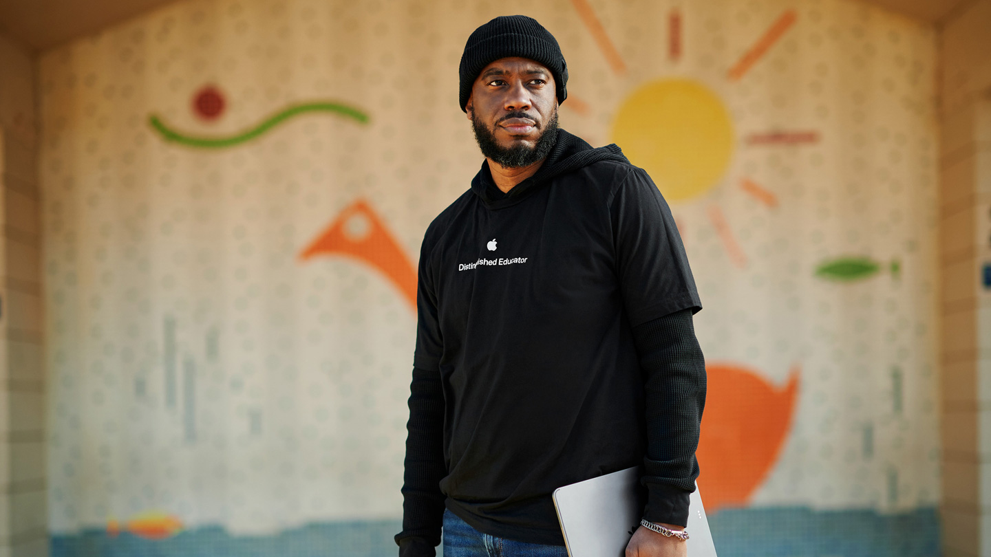 Mike Lang holding an iPad.