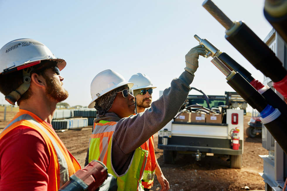 Crew checking electricity levels for the IP Radian Solar project in Brown County, Texas.