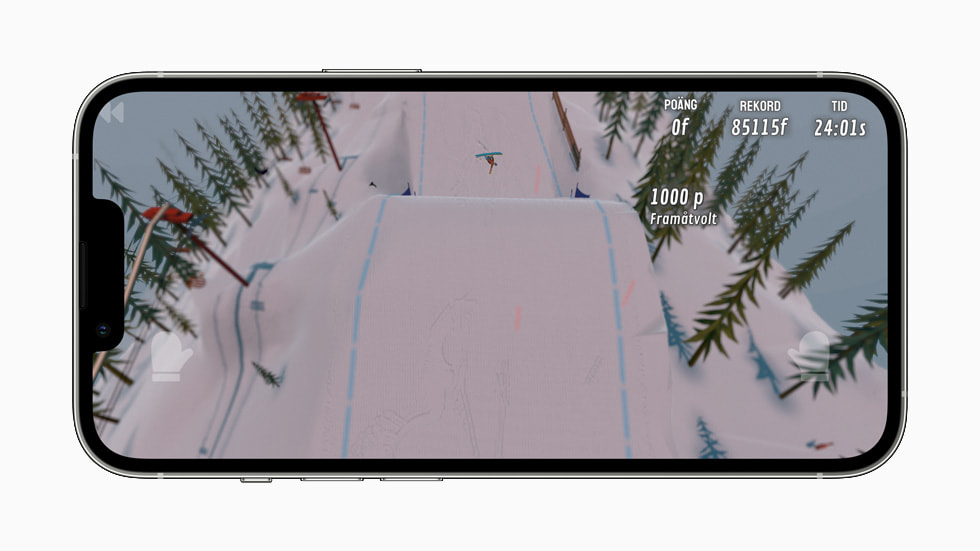 Grand Mountain Adventure visar en skidåkare som hoppar. 