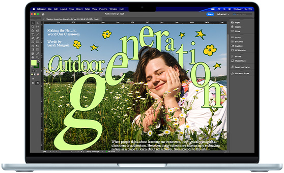 A MacBook Air displaying an Adobe InDesign project