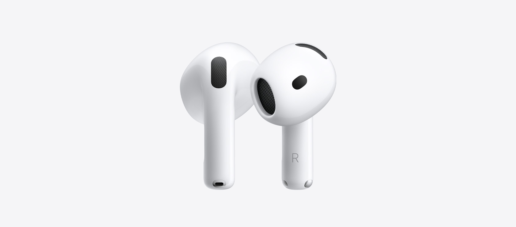 AirPods 5: wireless earbuds, white colour, oval-shaped, ear tip with interior acoustic speaker mesh, short stem with silver charging connector, left and right letter indicators