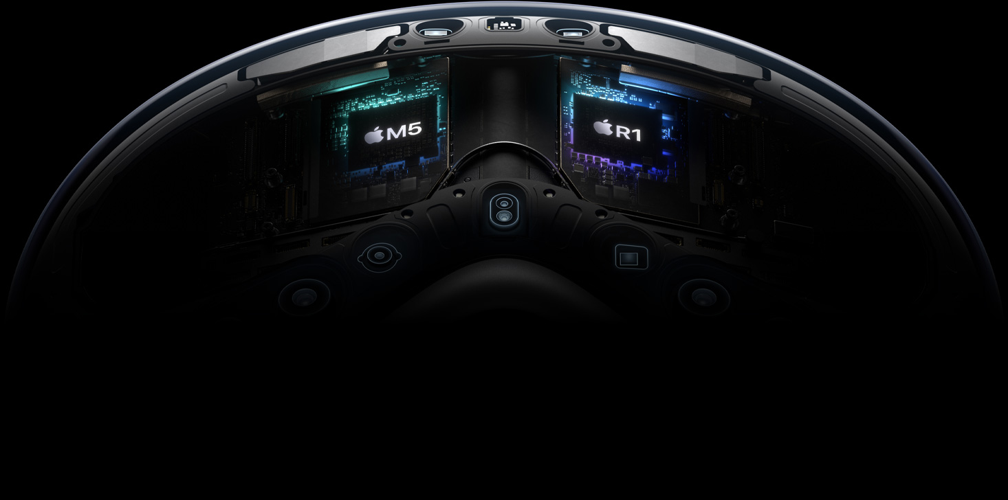 Technical, exploded view inside Apple Vision Pro highlighting the M5 and R1 chips