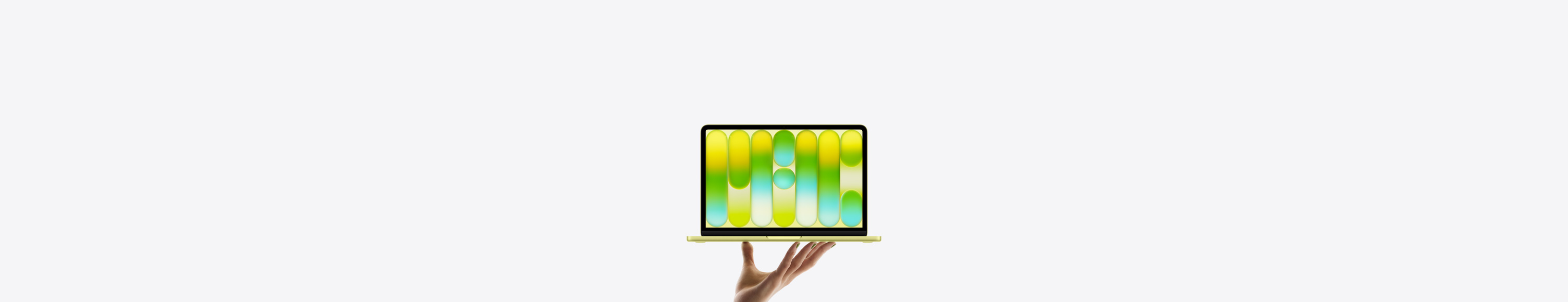 Ein MacBook Neo in der Farbe Zitrus wird auf den Fingerspitzen einer geöffneten Hand balanciert, das Display zeigt ein farbiges, abstraktes Muster